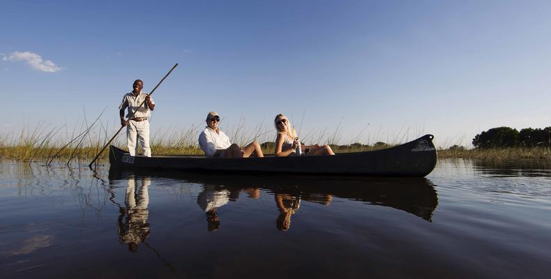 Explore the intricacies of the Okavango Delta the old fashioned way, in the traditional contours of the Mokoro (traditional dugout canoe)